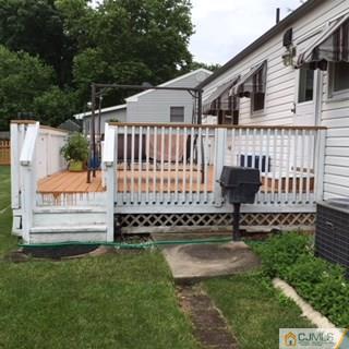 39 Montview Road Edison, NJ 08837 - Photo 4 of 5 a view of a house with a yard
