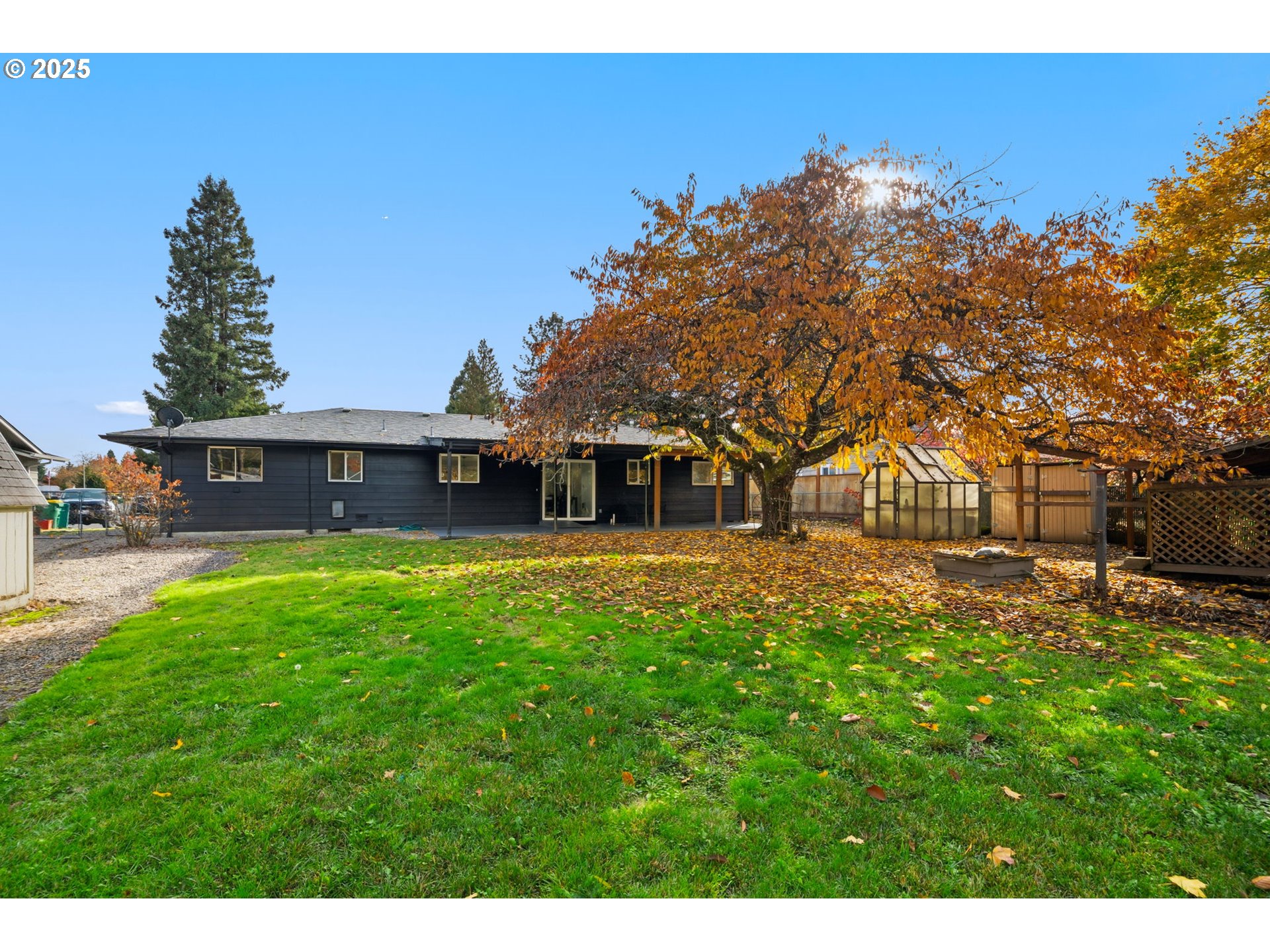 1425 Willamina Avenue Forest Grove, OR 97116 - Photo 23 of 38 a front view of a house with a yard