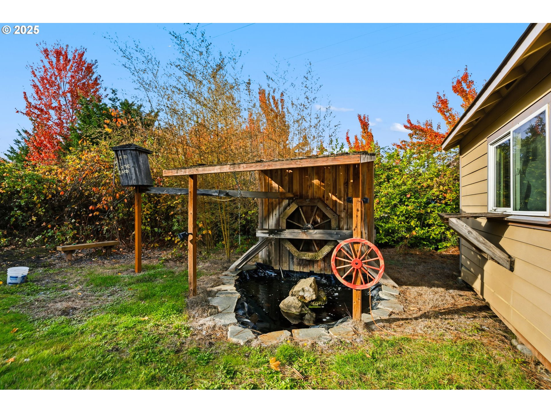 1425 Willamina Avenue Forest Grove, OR 97116 - Photo 25 of 38 a view of a backyard with wooden fence