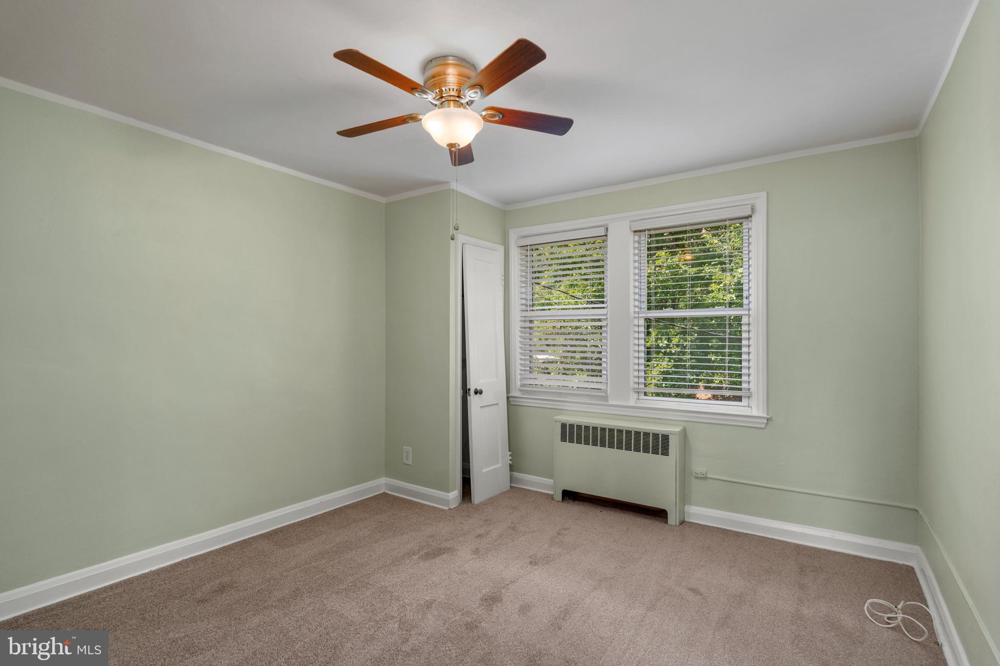 5708 Rockspring Road, Unit B Baltimore, MD 21209 - Photo 7 of 19 an empty room with a window