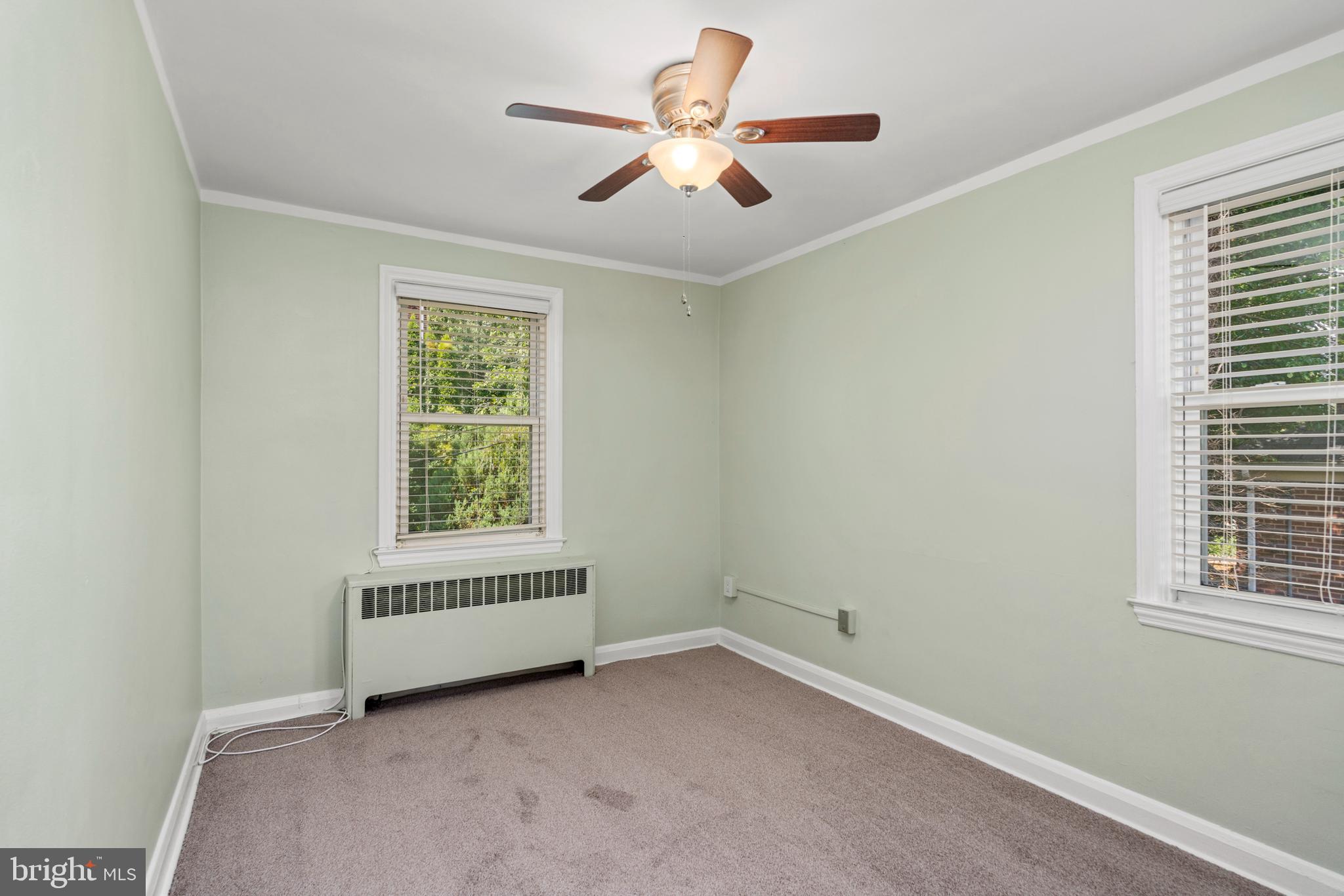 5708 Rockspring Road, Unit B Baltimore, MD 21209 - Photo 9 of 19 a view of an empty room with a window