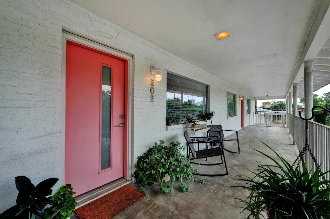 1208 Enfield Road, Unit 202 Austin, TX 78703 - Photo 2 of 19 a outdoor space with chairs