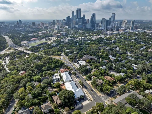 an aerial view of a city with lots of residential buildings