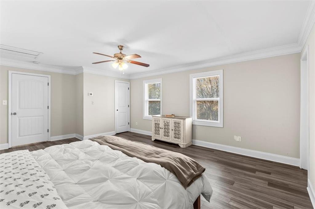 718 Baskin Road Temple, GA 30179 - Photo 19 of 50 a bedroom with a large bed and a window