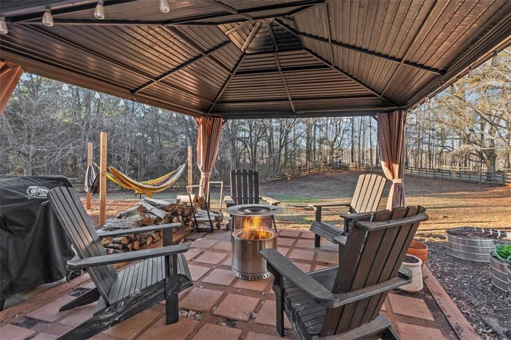 718 Baskin Road Temple, GA 30179 - Photo 34 of 50 an outdoor sitting area with furniture