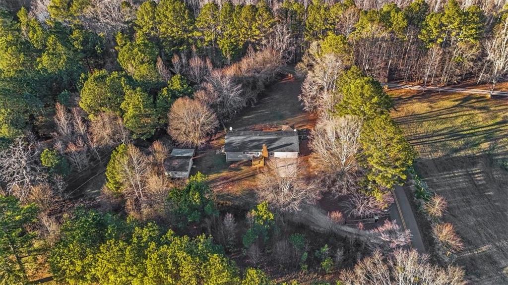 718 Baskin Road Temple, GA 30179 - Photo 46 of 50 a backyard of a house with green space