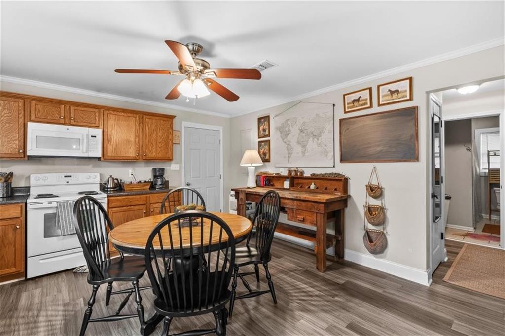 718 Baskin Road Temple, GA 30179 - Photo 10 of 50 a dining room with furniture and window