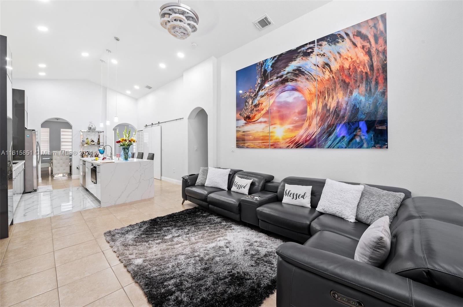 24044 Southwest 107th Court Homestead, FL 33032 - Photo 11 of 26 a living room with furniture and a couch