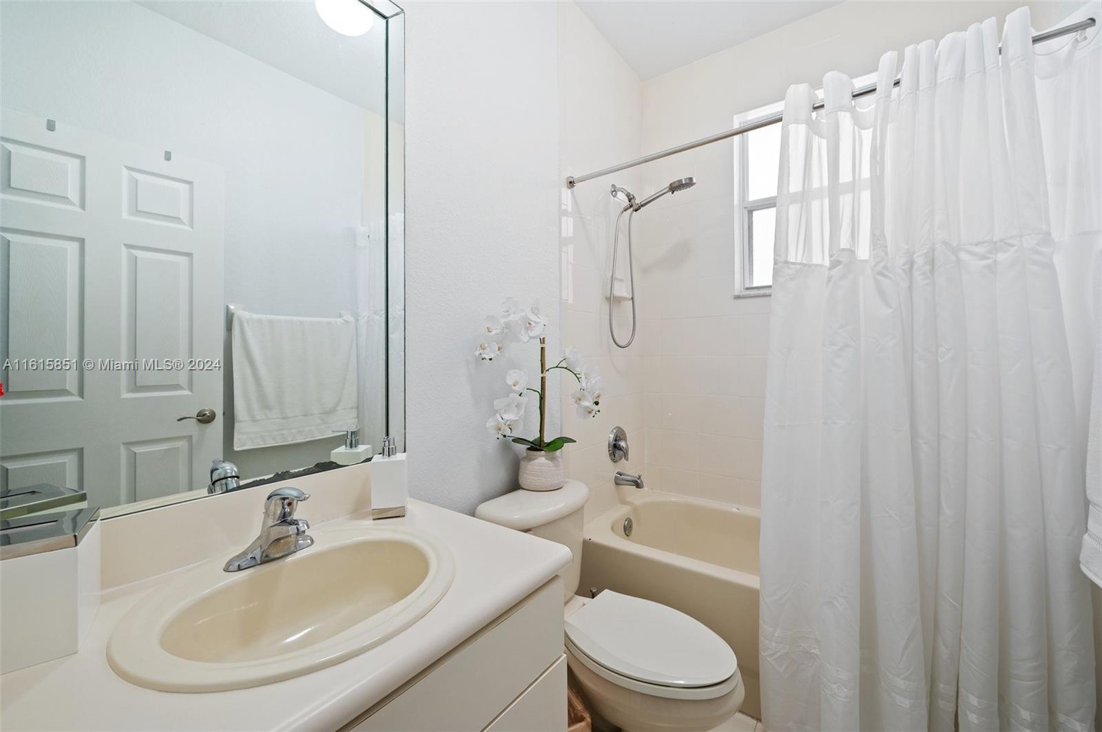 24044 Southwest 107th Court Homestead, FL 33032 - Photo 17 of 26 a bathroom with a sink toilet and shower