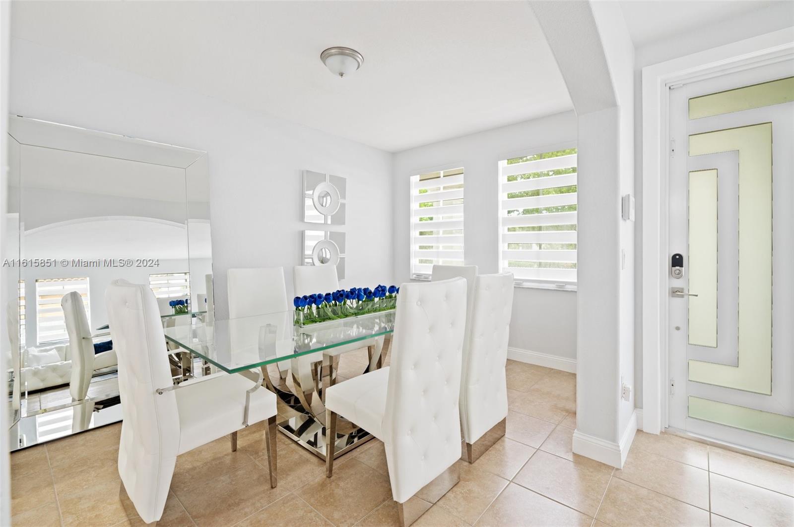 24044 Southwest 107th Court Homestead, FL 33032 - Photo 6 of 26 a room with furniture and white walls