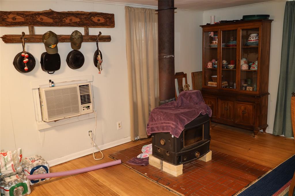 841 Dogwood Trail Logansport, LA 71049 - Photo 16 of 40 a living room with a couch and a table