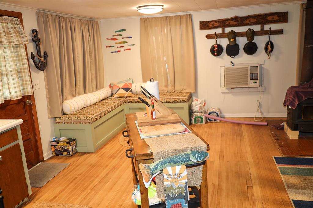 841 Dogwood Trail Logansport, LA 71049 - Photo 19 of 40 a bedroom with a bed and a walk in closet