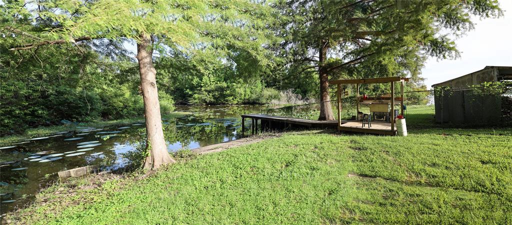 841 Dogwood Trail Logansport, LA 71049 - Photo 34 of 40 a view of backyard with green space