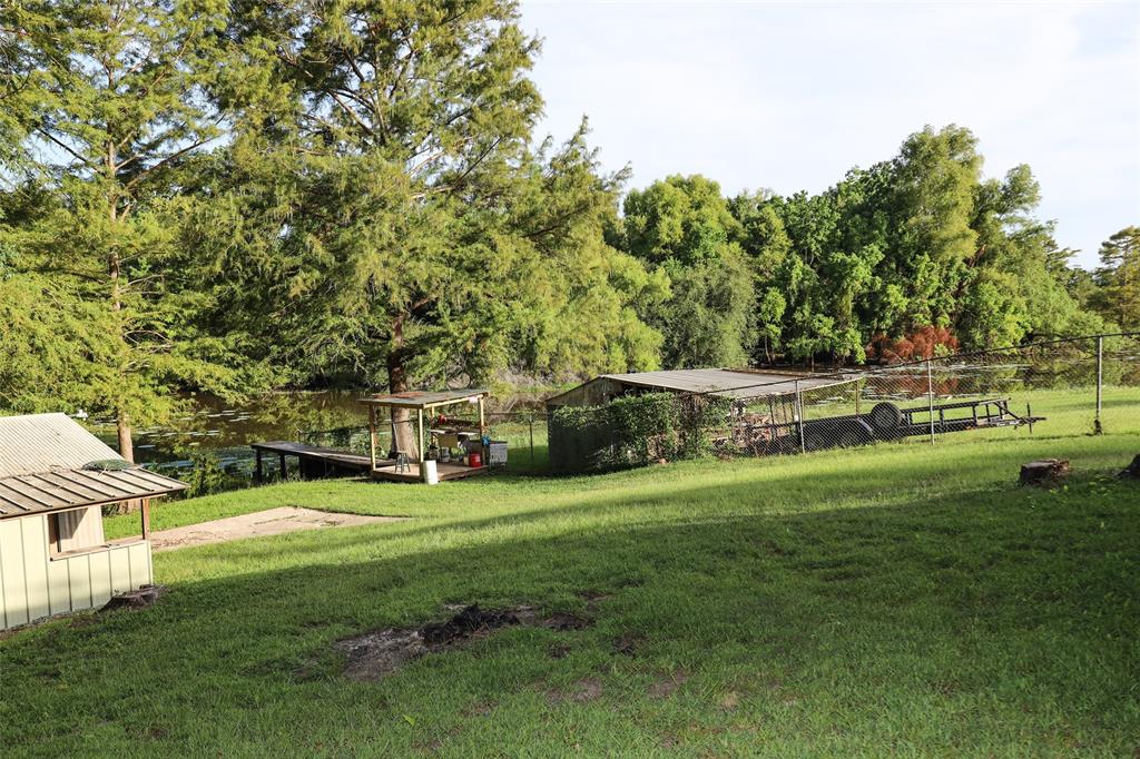 841 Dogwood Trail Logansport, LA 71049 - Photo 36 of 40 a view of a house with a big yard