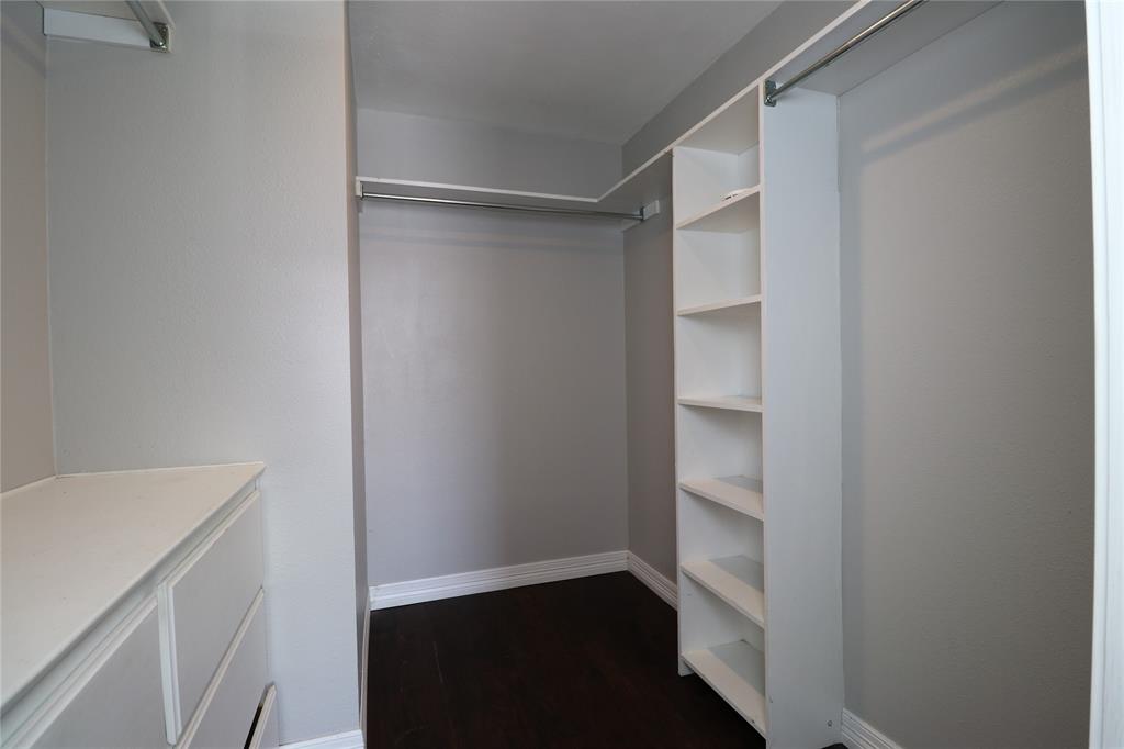 200 Red Oak Creek Road Oak Leaf, TX 75154 - Photo 5 of 11 a view of an empty walk in closet