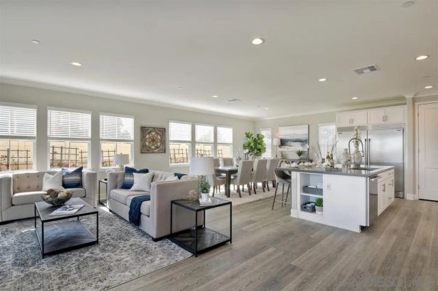 a living room with furniture and a table