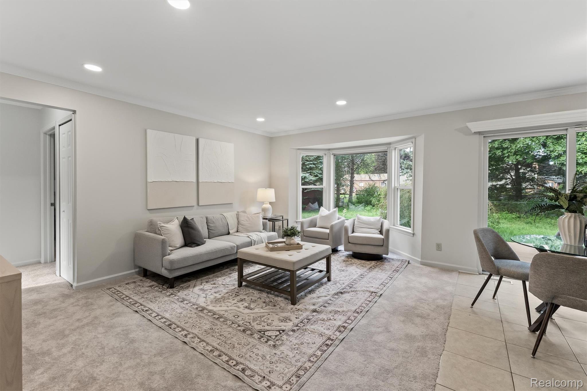 39861 Rager Court Clinton Township, MI 48038 - Photo 6 of 26 Recessed lighting and crown molding in living area