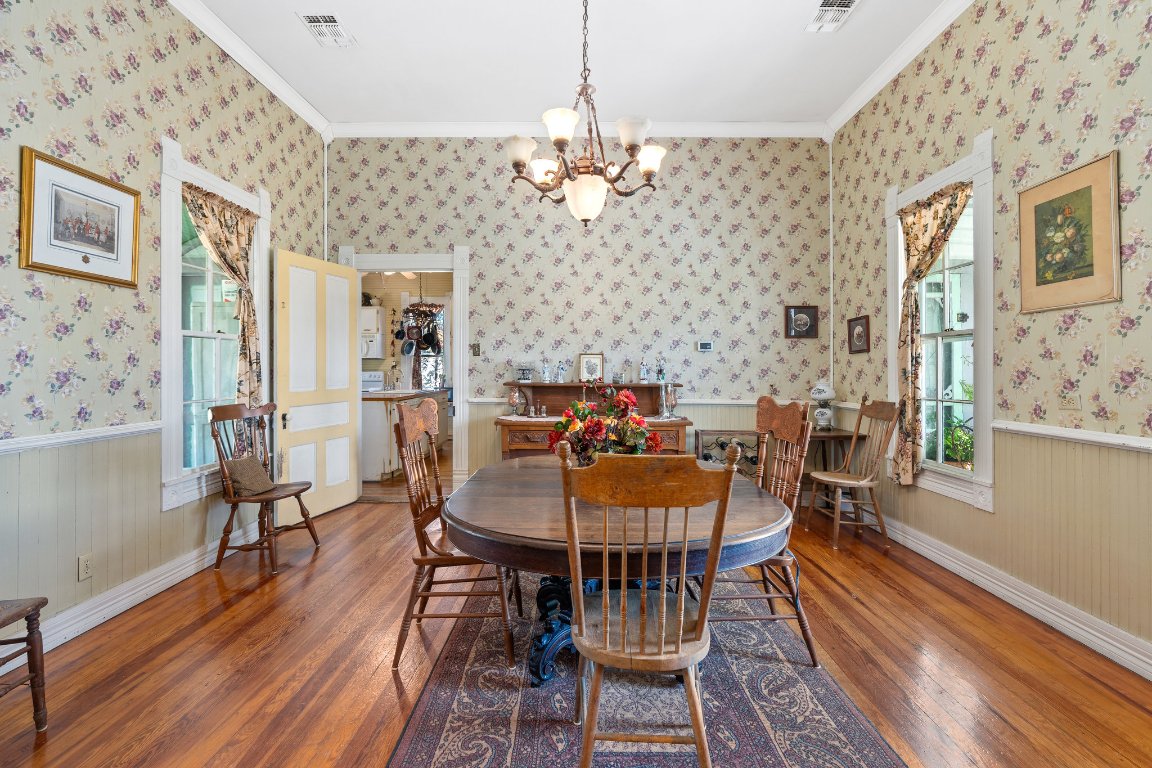 115 Fischer Store Road Fischer, TX 78623 - Photo 11 of 38 a view of a dining room with furniture window and wooden floor