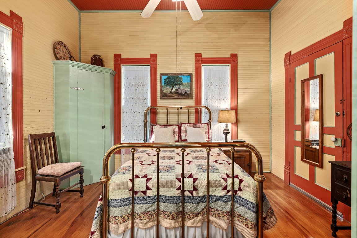 115 Fischer Store Road Fischer, TX 78623 - Photo 20 of 38 a view of a balcony with furniture and large windows