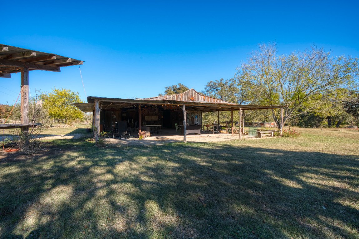 115 Fischer Store Road Fischer, TX 78623 - Photo 23 of 38 a front view of a house with a garden