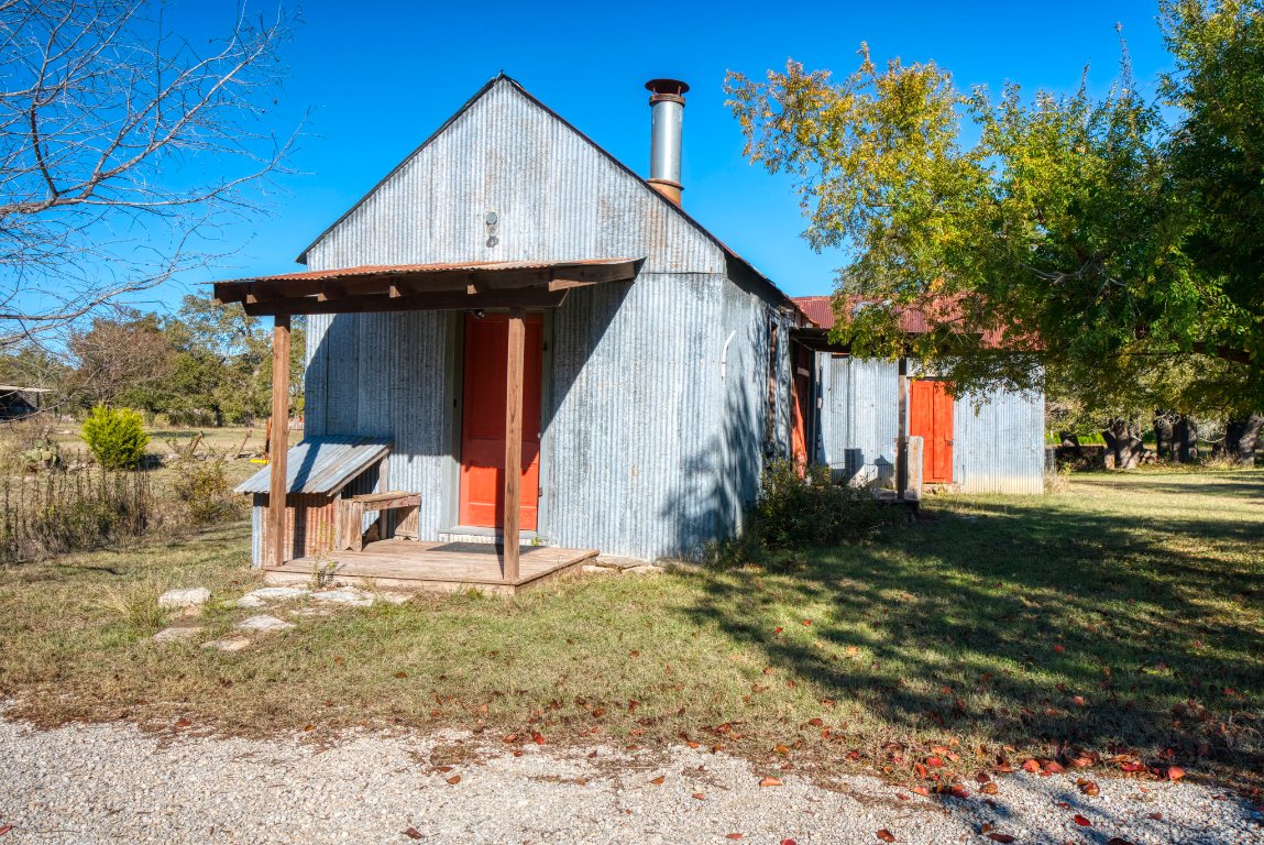 115 Fischer Store Road Fischer, TX 78623 - Photo 27 of 38 a house view with a backyard space