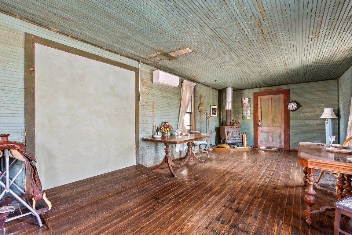 115 Fischer Store Road Fischer, TX 78623 - Photo 29 of 38 wooden floor in an empty room with a window