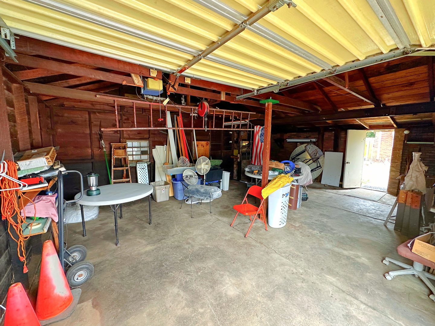 1121 East Main Street Streator, IL 61364 - Photo 22 of 22 a view of garage with a table and chairs
