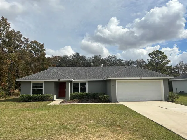 front view of a house and a yard