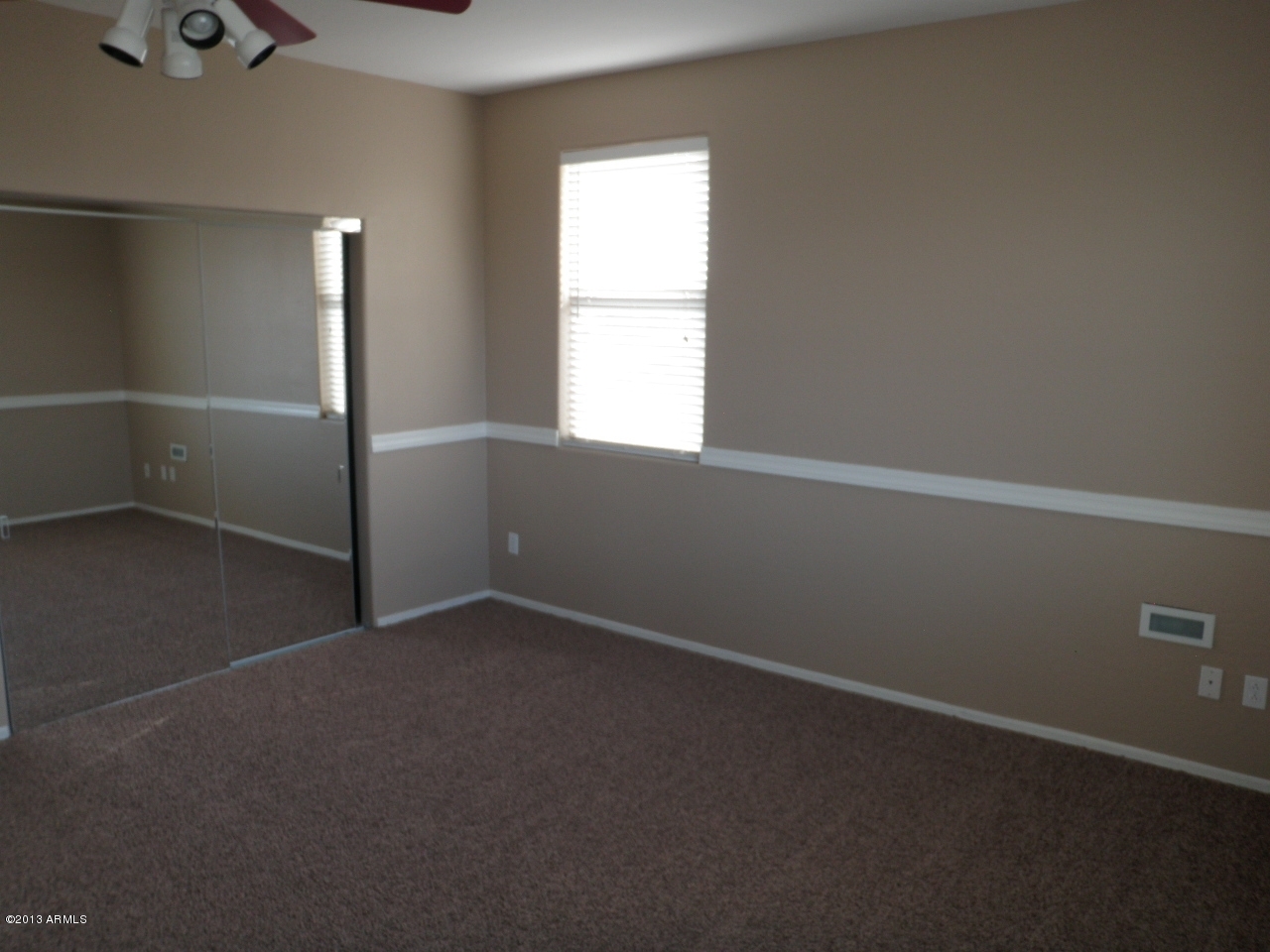 3672 South Martingale Road Gilbert, AZ 85297 - Photo 26 of 45 an empty room with windows