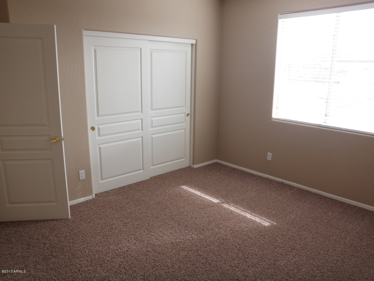 3672 South Martingale Road Gilbert, AZ 85297 - Photo 27 of 45 an empty room with windows