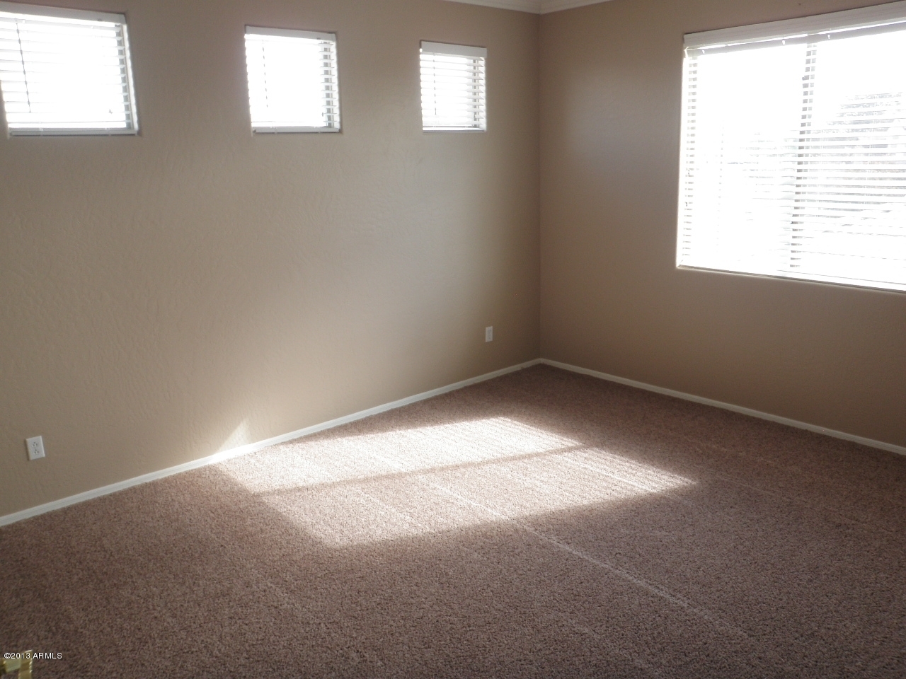 3672 South Martingale Road Gilbert, AZ 85297 - Photo 28 of 45 an empty room with a window