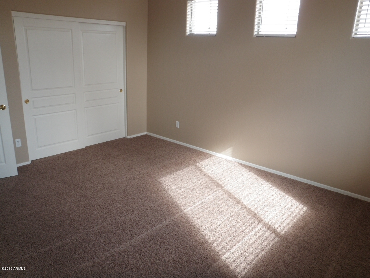 3672 South Martingale Road Gilbert, AZ 85297 - Photo 29 of 45 an empty room with windows