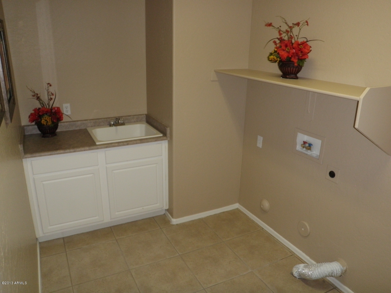 3672 South Martingale Road Gilbert, AZ 85297 - Photo 39 of 45 a view of storage and utility room with a small space