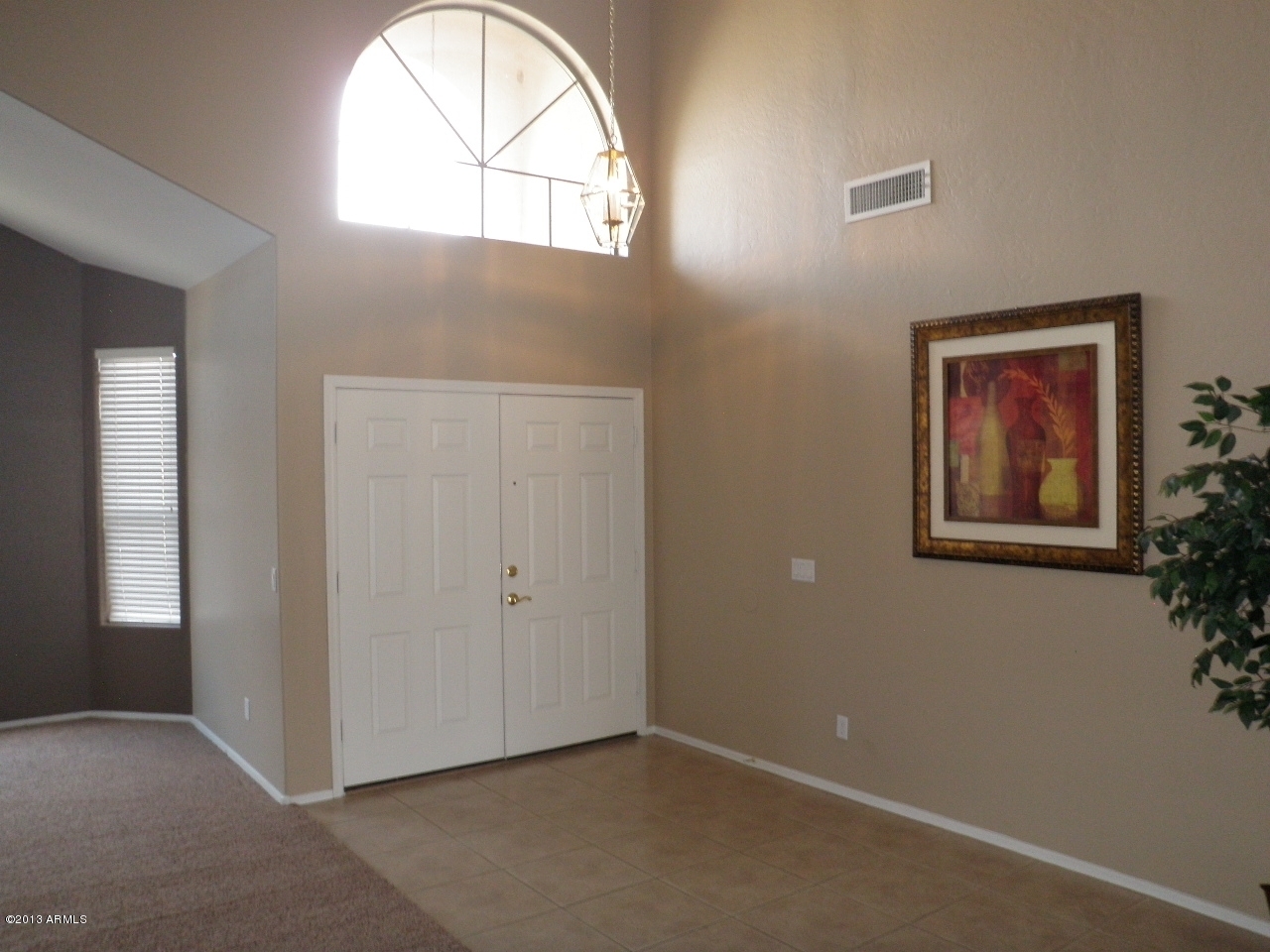 3672 South Martingale Road Gilbert, AZ 85297 - Photo 4 of 45 an empty room with windows and closet