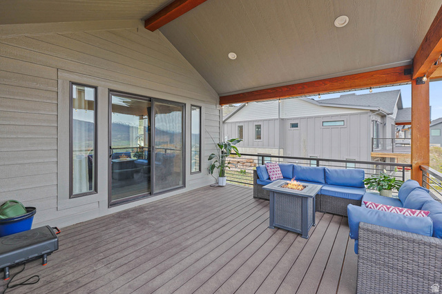 4527 North Seven Bridges Road Eden, UT 84310 - Photo 49 of 65 Deck featuring an outdoor living space with a fire pit