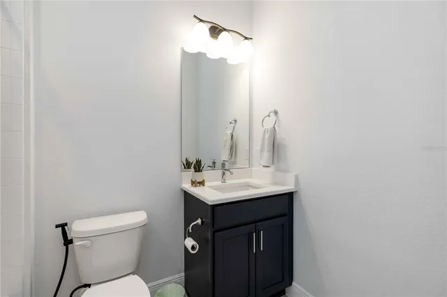 a bathroom with a sink and a toilet
