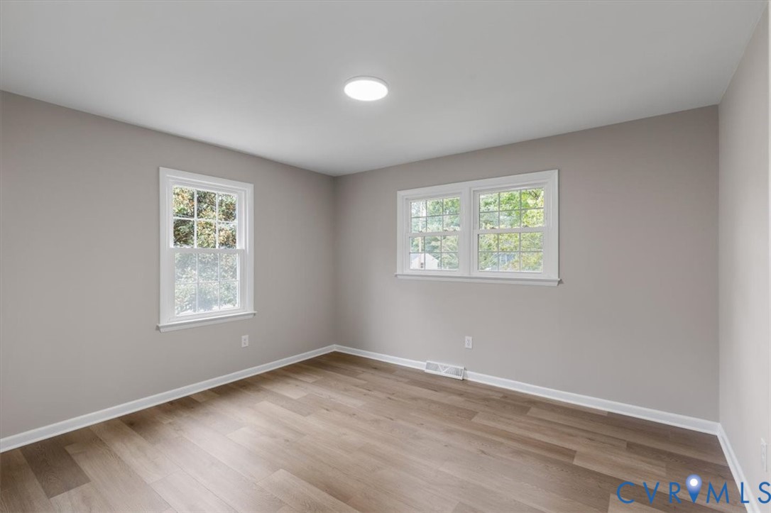 3308 Sylvania Road Chester, VA 23831 - Photo 25 of 55 Wood-finish flooring, white trim, recessed lightin