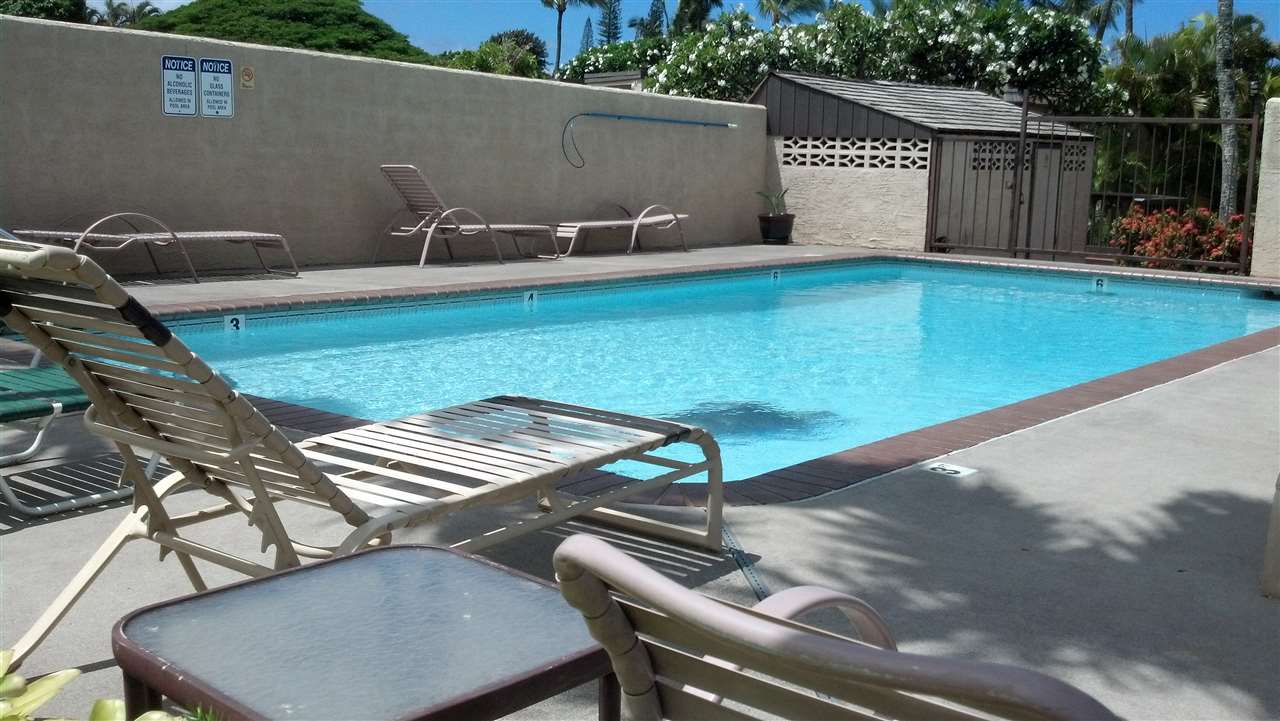 120 Hui F Road, Unit I6 Lahaina, HI 96761 - Photo 11 of 13 a view of a backyard with sitting area
