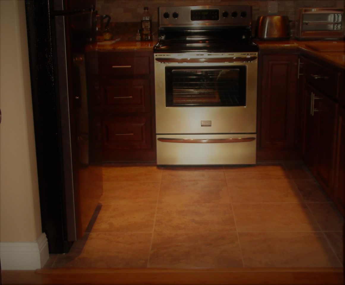 120 Hui F Road, Unit I6 Lahaina, HI 96761 - Photo 5 of 13 a stove top oven sitting inside of a kitchen