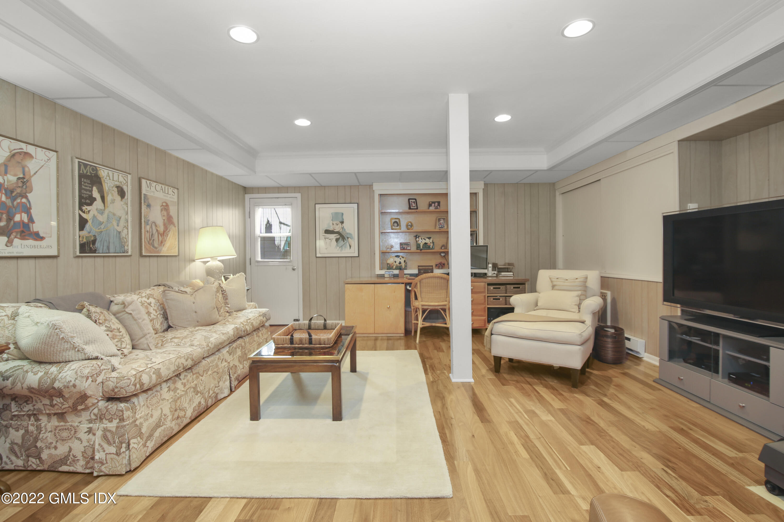 155 Field Point Road, Unit 2N Greenwich, CT 06830 - Photo 12 of 19 a living room with furniture and a flat screen tv