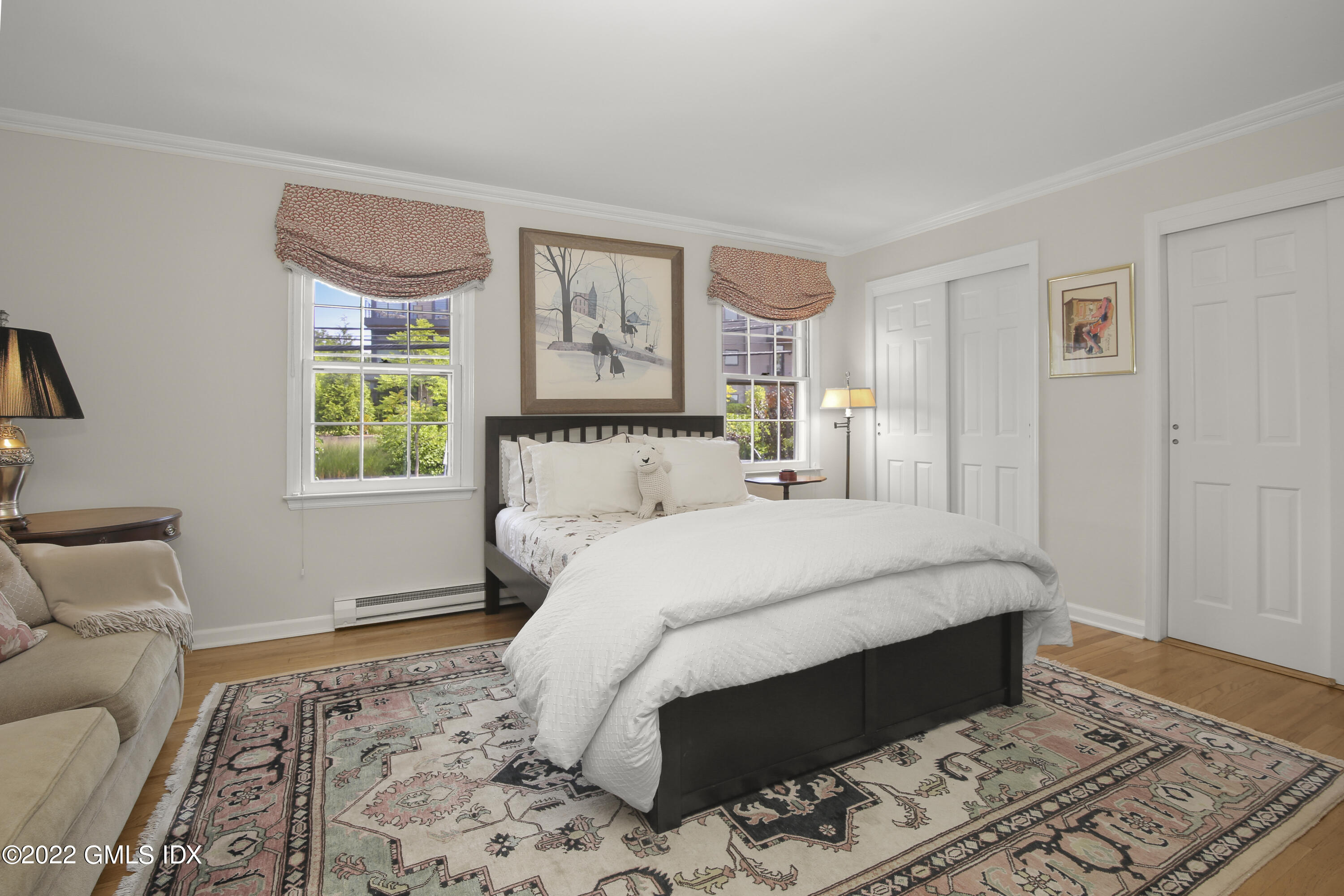 155 Field Point Road, Unit 2N Greenwich, CT 06830 - Photo 10 of 19 a bedroom with a bed and a window