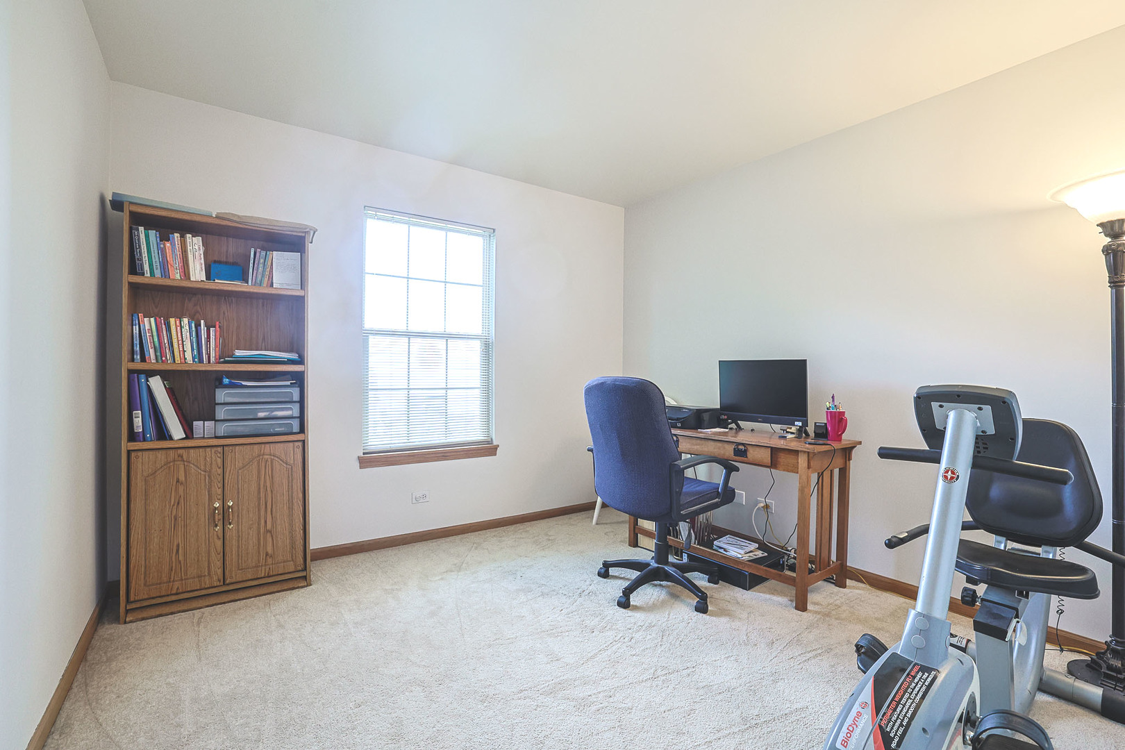 3080 Wagner Road Aurora, IL 60502 - Photo 16 of 31 a view of a workspace with furniture and a window