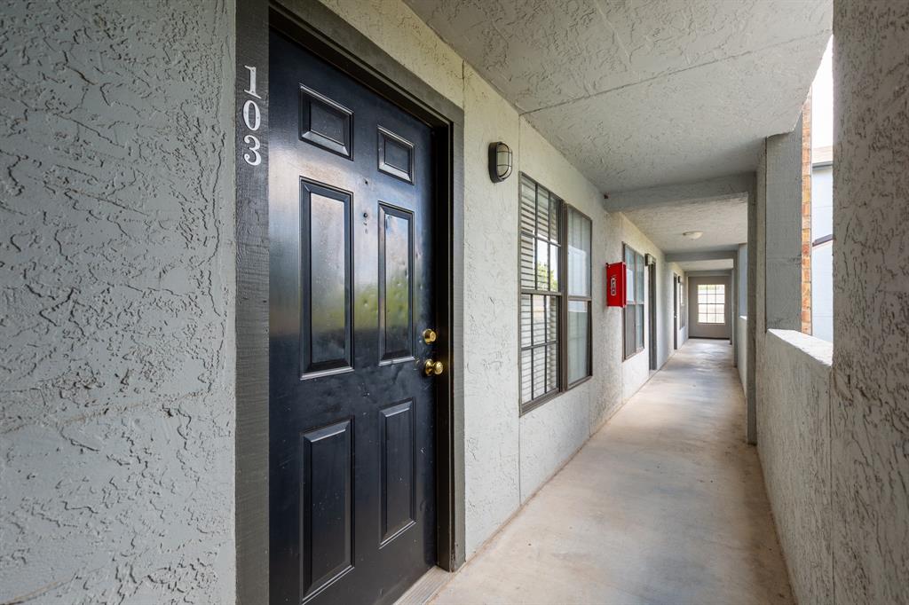 1013 West 23rd Street, Unit 104 Austin, TX 78705 - Photo 10 of 11 Entrance to property with stucco siding