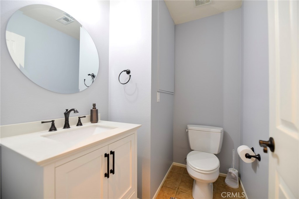 24 Paseo Rosa San Clemente, CA 92673 - Photo 17 of 35 a bathroom with a sink toilet and mirror