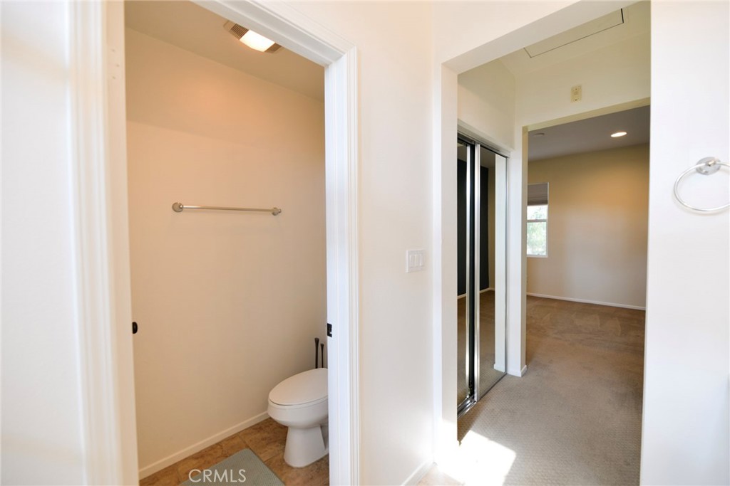 24 Paseo Rosa San Clemente, CA 92673 - Photo 30 of 35 a bathroom with a granite countertop toilet and a sink
