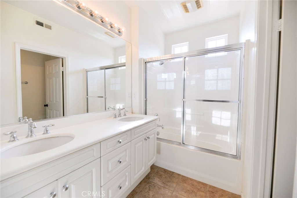 24 Paseo Rosa San Clemente, CA 92673 - Photo 31 of 35 a bathroom with a granite countertop sink mirror and double
