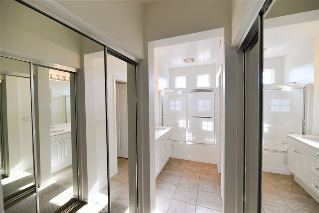 24 Paseo Rosa San Clemente, CA 92673 - Photo 32 of 35 a bathroom with a glass shower door and a glass door