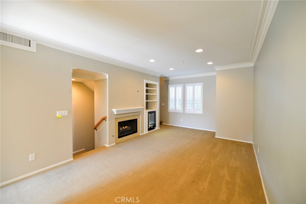 24 Paseo Rosa San Clemente, CA 92673 - Photo 6 of 35 a view of livingroom with a fireplace