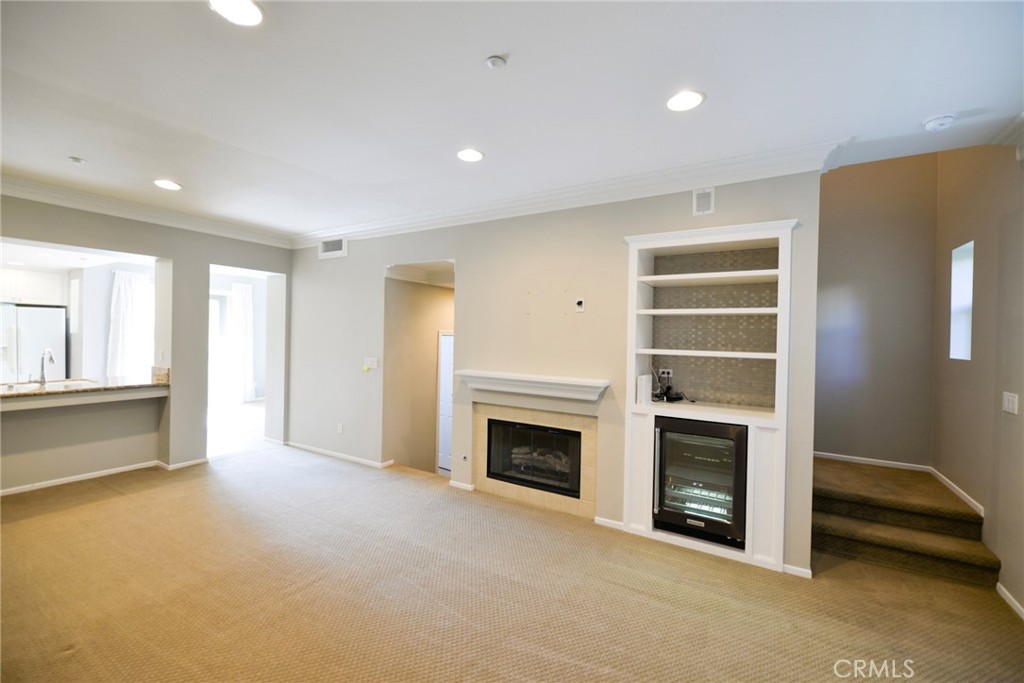 24 Paseo Rosa San Clemente, CA 92673 - Photo 8 of 35 a view of an empty room with a fireplace and a window