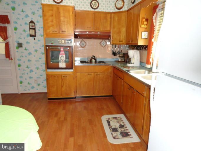 7825 Belgaro Road Laurel, MD 20723 - Photo 7 of 29 Kitchen